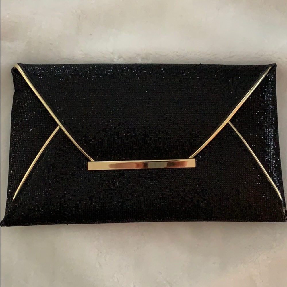 Black and gold glitter clutch